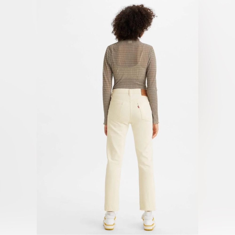 Levi’s button fly crop white denim.
